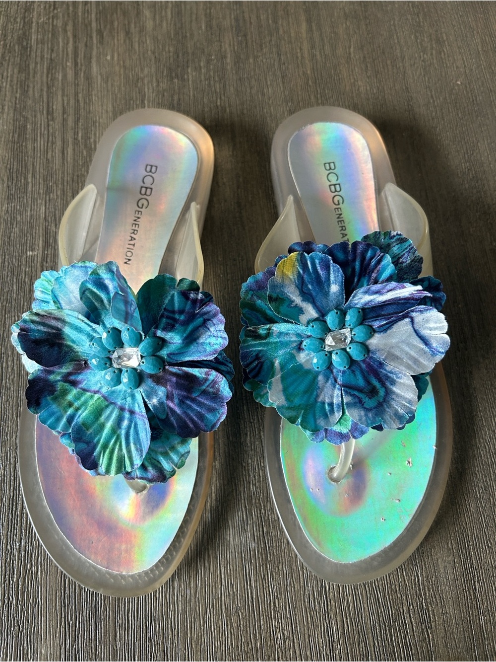 BCBGeneration Iridescent Jelly Slides with Blue Floral Embellishments, Sz.7.